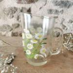 Pichet ancien en verre épais, motifs Marguerites