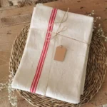 Torchon ancien en lin, 3 liteaux rouges de 1930